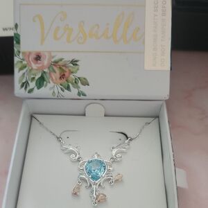 Versailles Silver Necklace with Blue Topaz Center and Peach Accent Drops